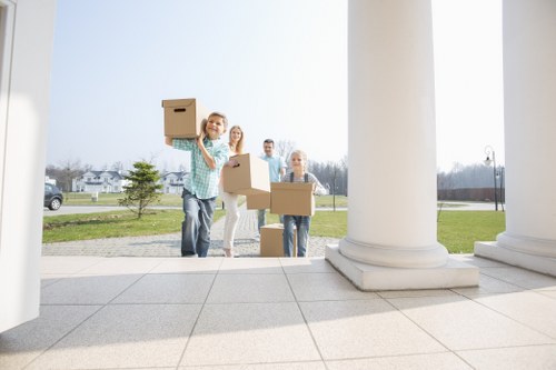 Packing and moving household items with a removals van