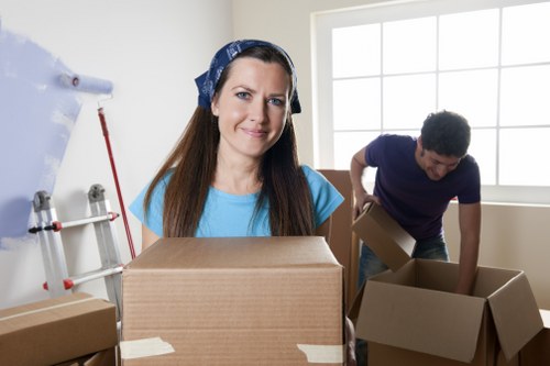 Removals team sorting reusable and recyclable household items