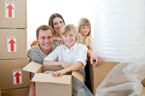 Packed boxes and furniture ready for loading during a local house move