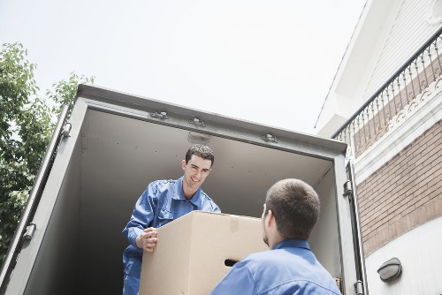 Professional removals crew handling items carefully during a move
