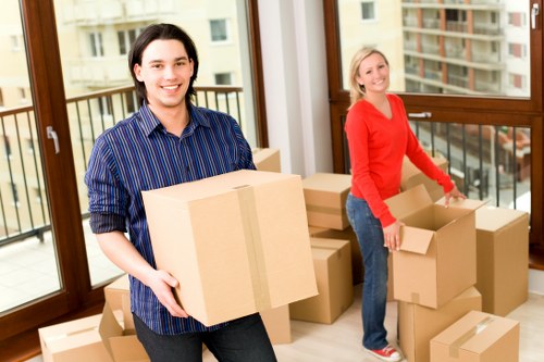 Closing view of a professional removals crew following safety procedures